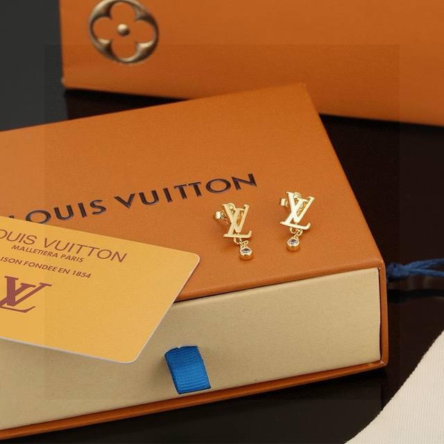 Louis Vuitton letter earrings, crafted with exquisite craftsmanship and polishe