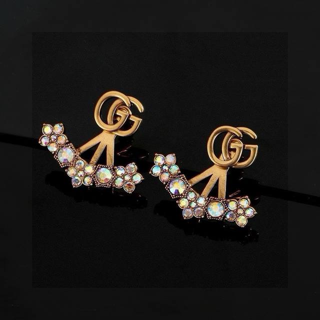Gucci's iconic double-G earrings feature the brand's signature initials present