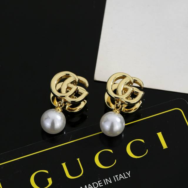 Gucci earrings, exquisitely crafted to the point of being breathtaking. Because