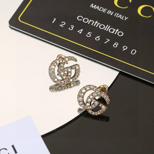 Gucci earrings, exquisitely crafted to the point of being breathtaking. Because