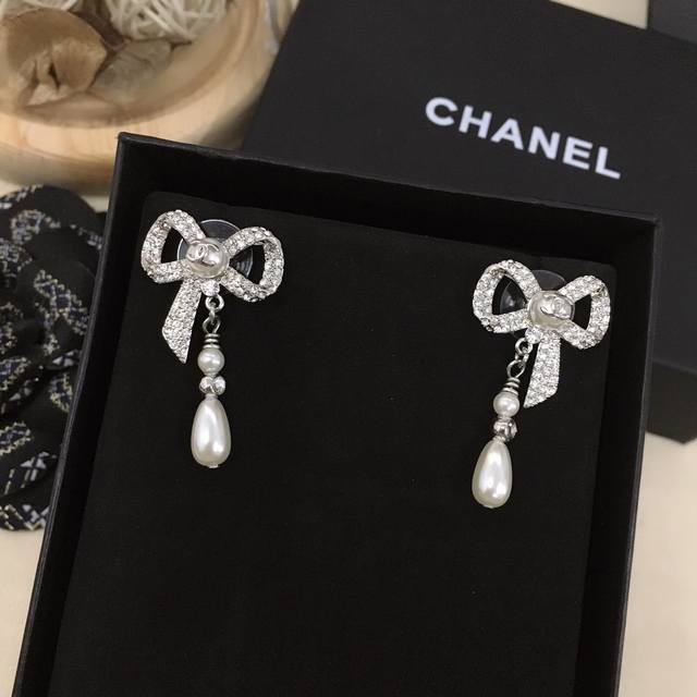 A highly recommended pair of Chanel's latest bow stud earrings from the boutiqu