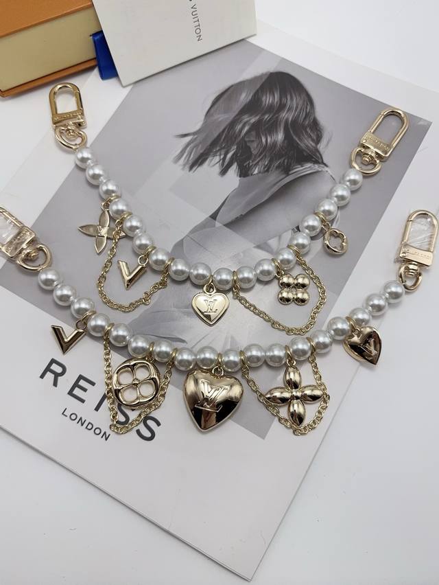 Lv Pearl Bag Charm Accessory Earl River bag charm reinterprets the brand's class