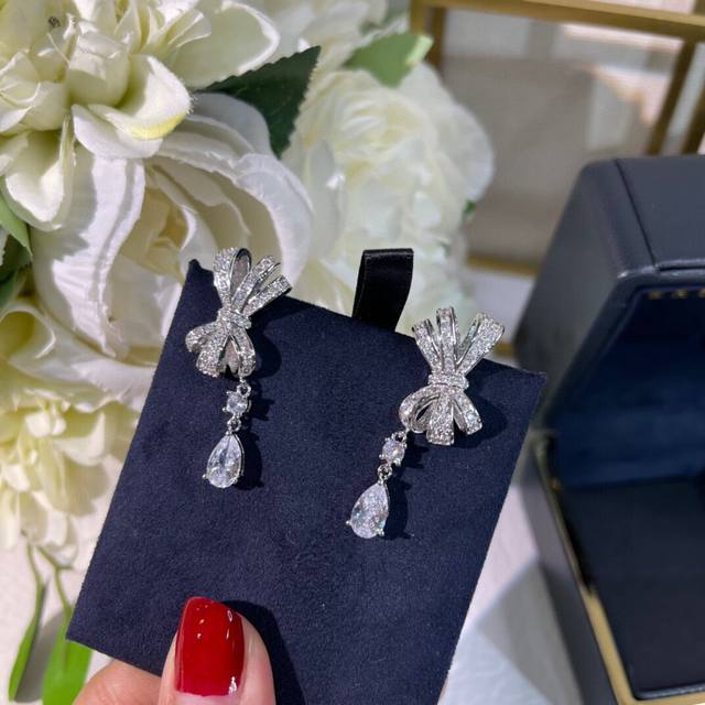 Featured Graff High-End Marquise Crystal Bow Teardrop Earrings. Elegant yet swe