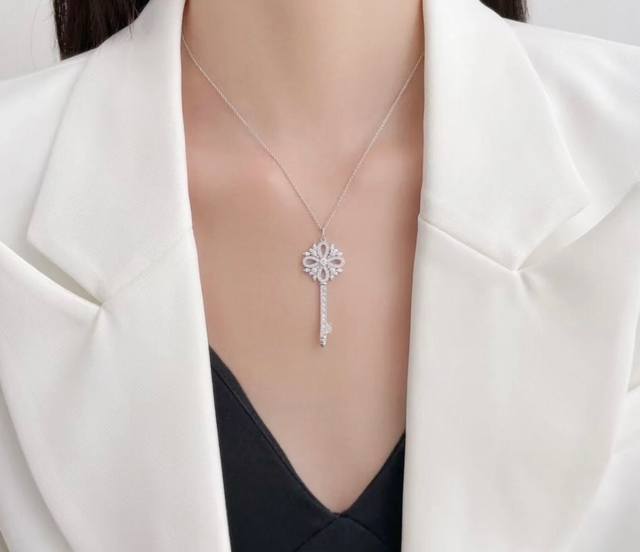 This Tiffany Christmas key necklace is now 925 sterling silver with a white gol