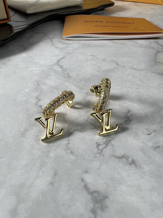 Lv Iconic earrings offer a sophisticated reinterpretation of the brand's classic