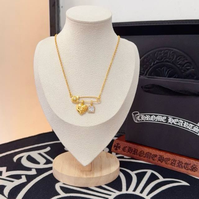 New boutique quality Chrome Hearts brooch with white diamond heart design. The