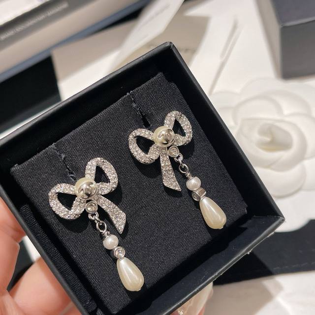 Item No. Xed0192 Ch*Nel Full Rhinestone Bow Earrings, same material as ZP. DDD