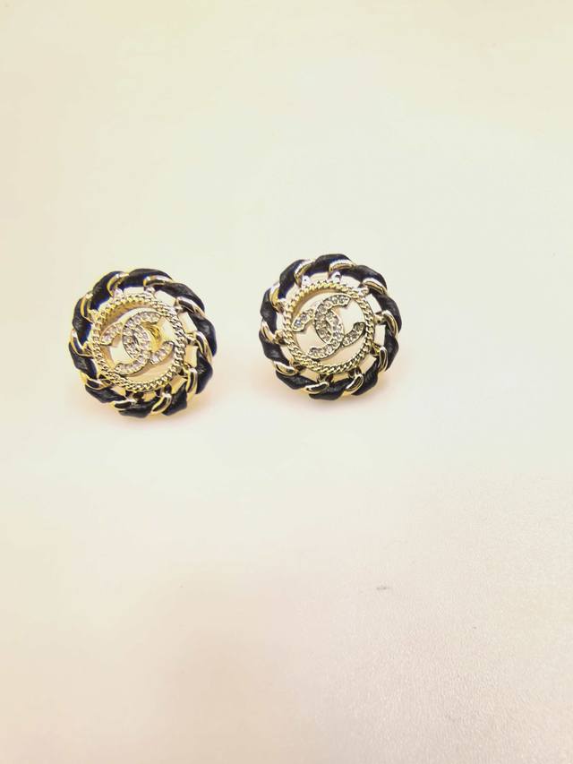 Ch*Nel Latest hollowed-out round black leather stud earrings, identical to the o