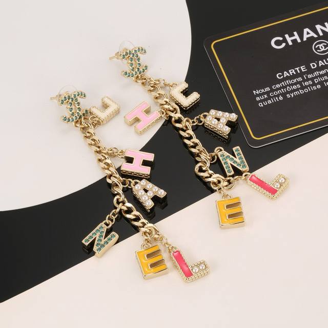 Chanel New Earrings Studs with Letter Drops and Dopamine Design. The simple lett