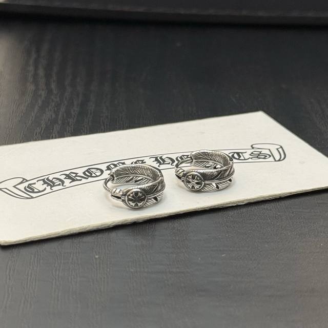 Authentic quality Chrome Hearts earrings. The unique design features raised and