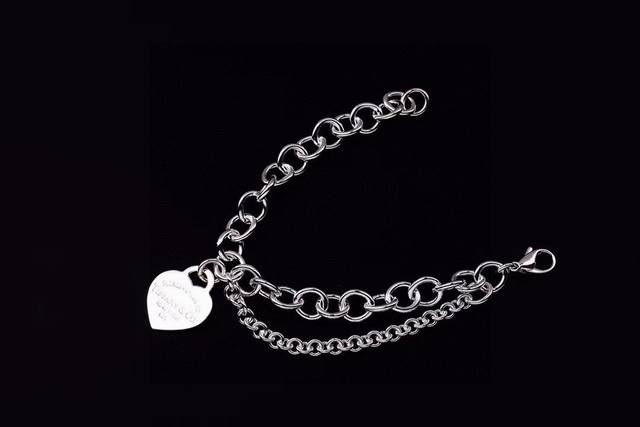 Tiffany & Co. Heart-shaped Buckle Bracelet This uniquely designed heart-shaped b