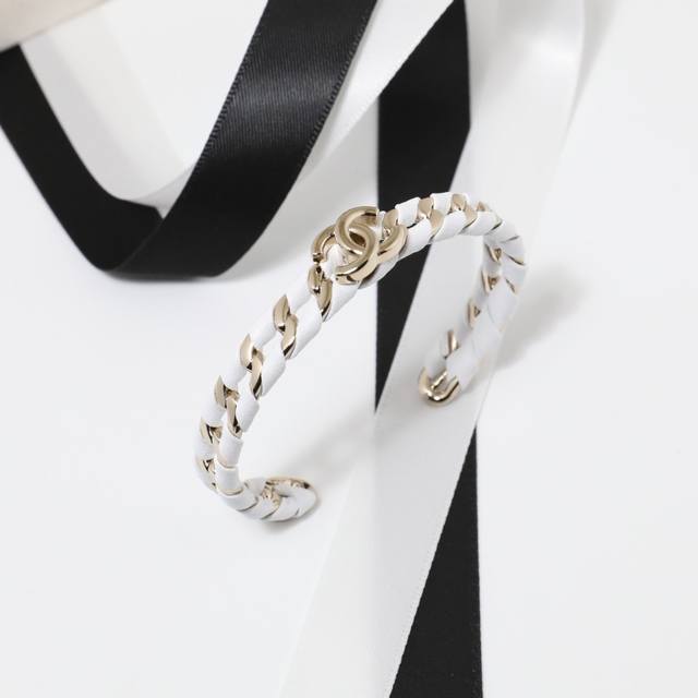 Ch Nel Bangle: Double-layered braided lambskin double C-opening women's bangle.