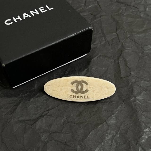 Chanel Vintage Hair Clip Super chic bronze color, paired with the classic double