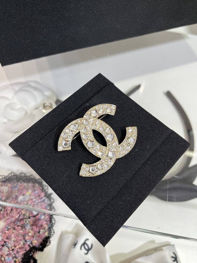 Gold Brooch 25-Star Crystal Pearl Double C Brooch A very elaborate combination o