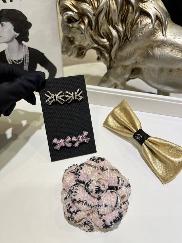 25B Double C Pink and Black Enamel Bow Earrings The black and white color scheme