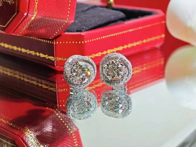 Exquisite Cartier single diamond stud earrings. Eight hearts and eight arrows h