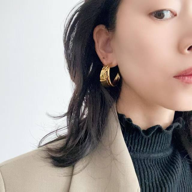 Saint Laurent earrings with a super strong metallic texture, made of original b