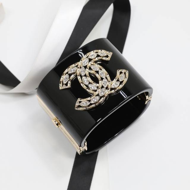 Ch Nel Bracelet: Imported acrylic, 18K gold plated, brass material. Very elegant