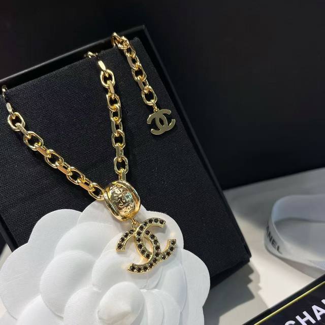 25A Amber-colored rhinestone double C ring letter necklace