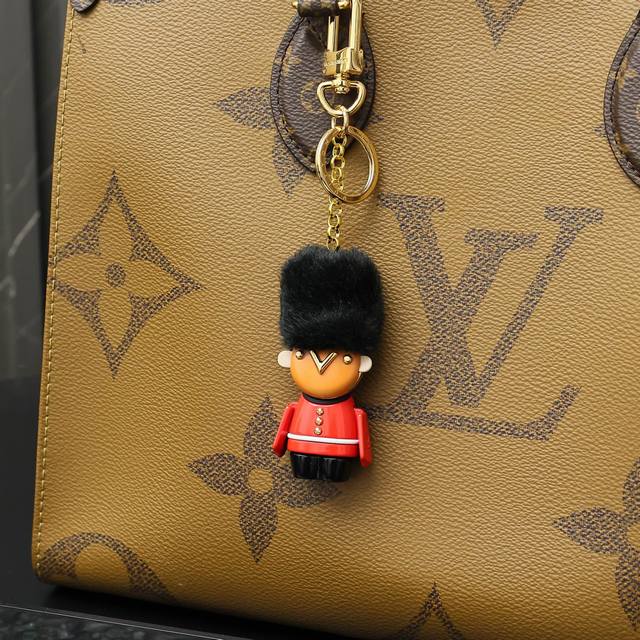 Lv London Guard Gaston plush toy keychain. Dressed in a neat uniform and soft to