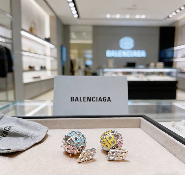 Balenciaga's "King of Earrings" collection, updated simultaneously at boutiques.