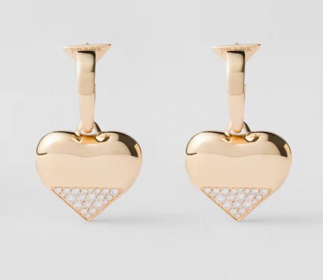 Prada Triangle Earrings - A hot new arrival online! Simple, elegant, stylish, an