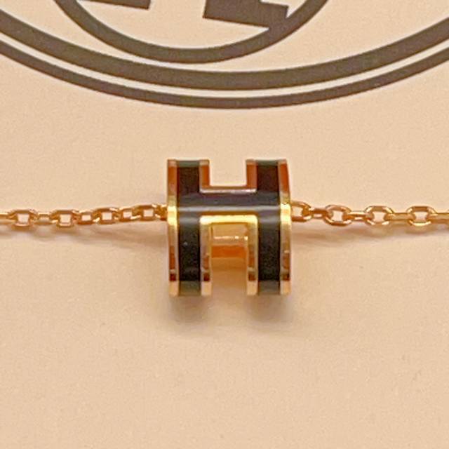 He Mes' latest black enamel mini rose gold necklace, made of the same Z batch br