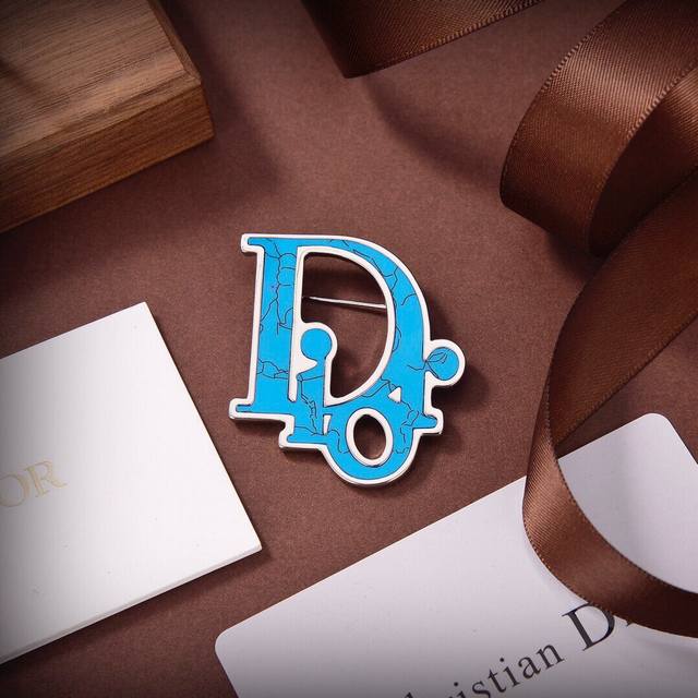 Batch of brand new, original Dior CD letter brooches, identical to those in bout