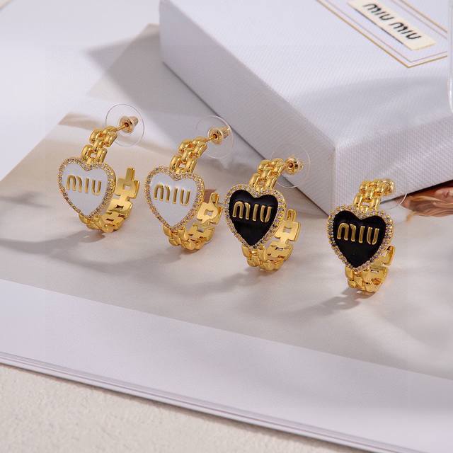 New original Miumiu logo resin earrings, identical to those in boutiques, made o
