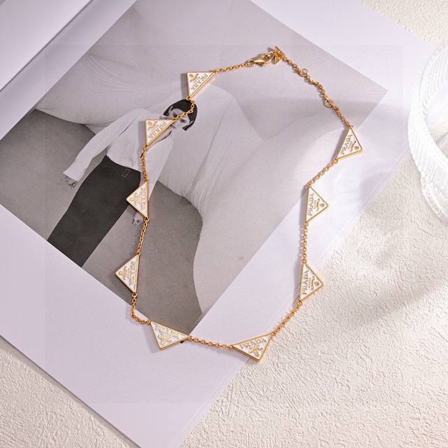 Prada Triangle Necklace and Bracelet Set - A hot new arrival online! Simple, ele