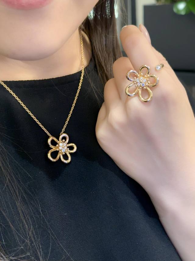 Sterling silver and copper version. We produce large flower rings, and can custo