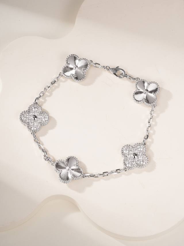 Magic Irregular Pattern Four-Leaf Clover Bracelet features a classic four-leaf c