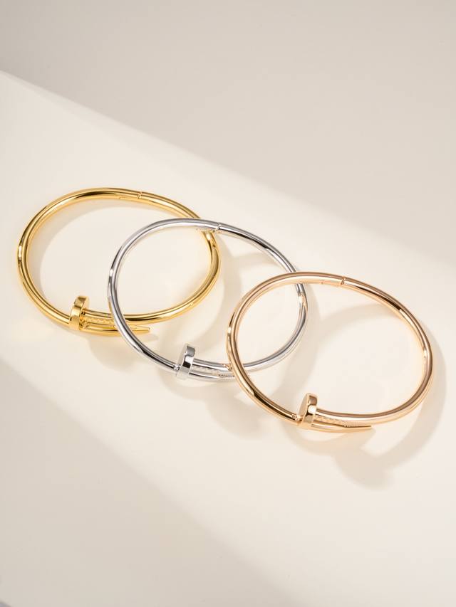 Old Cartier's classic nail-patterned chunky bangle, sizes 16, 17, and 18. Someon